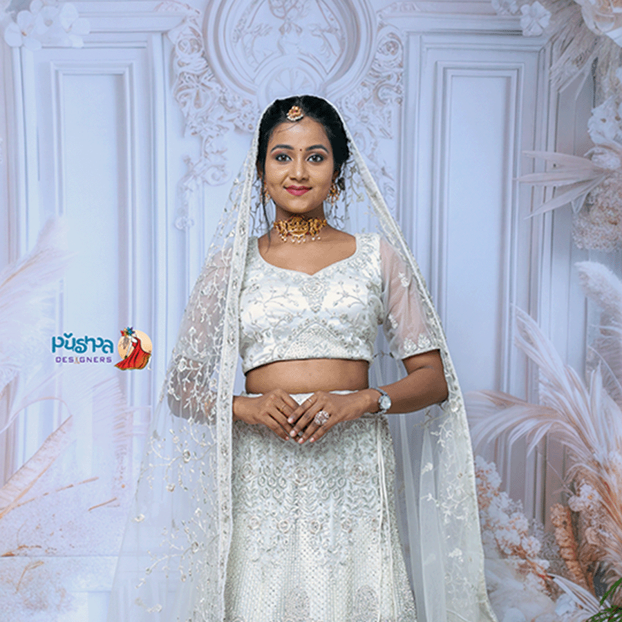 White Heavy Lehenga — Pushpa Designers